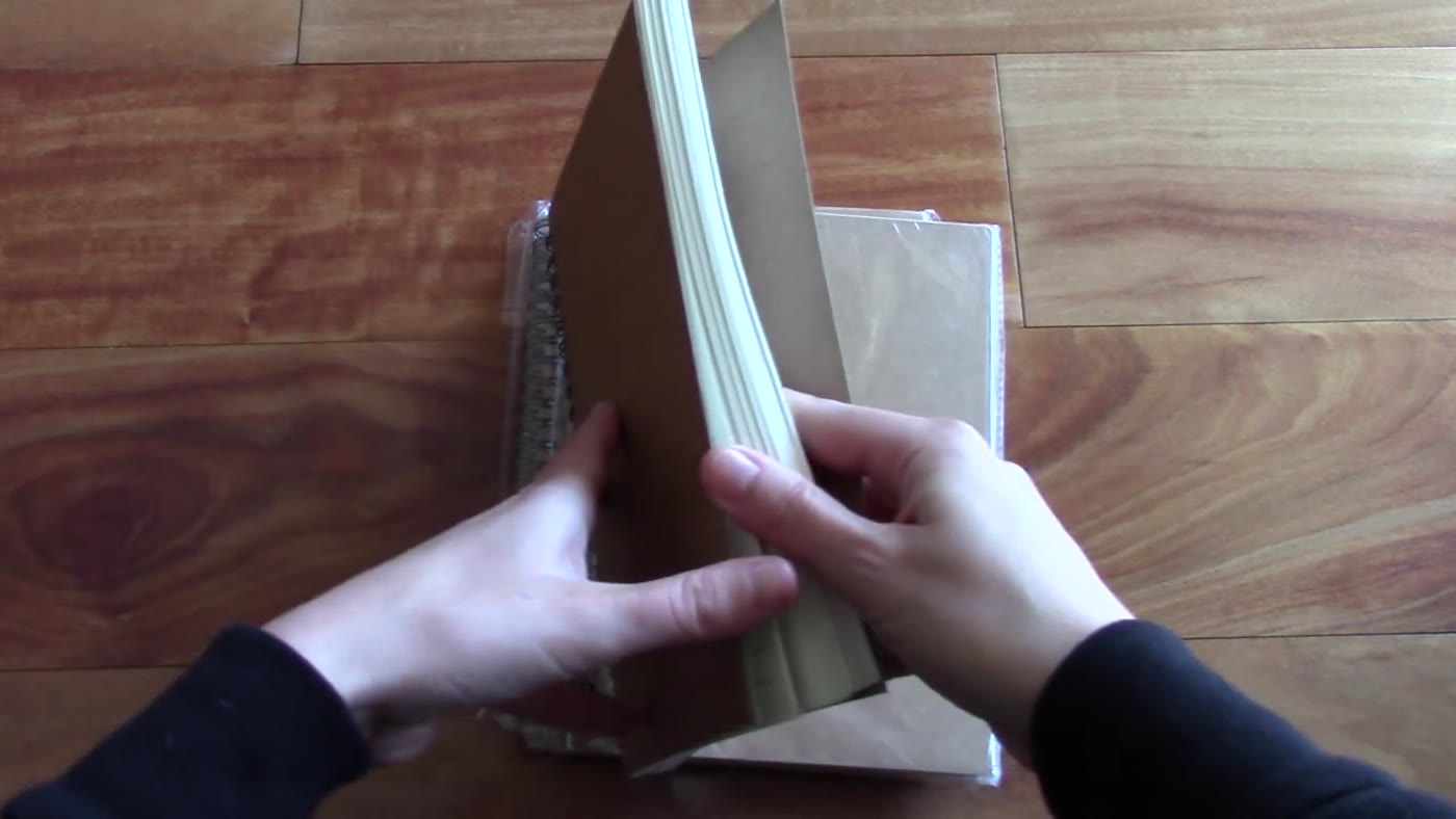 Emerging Green notebook page block and spiral binding
