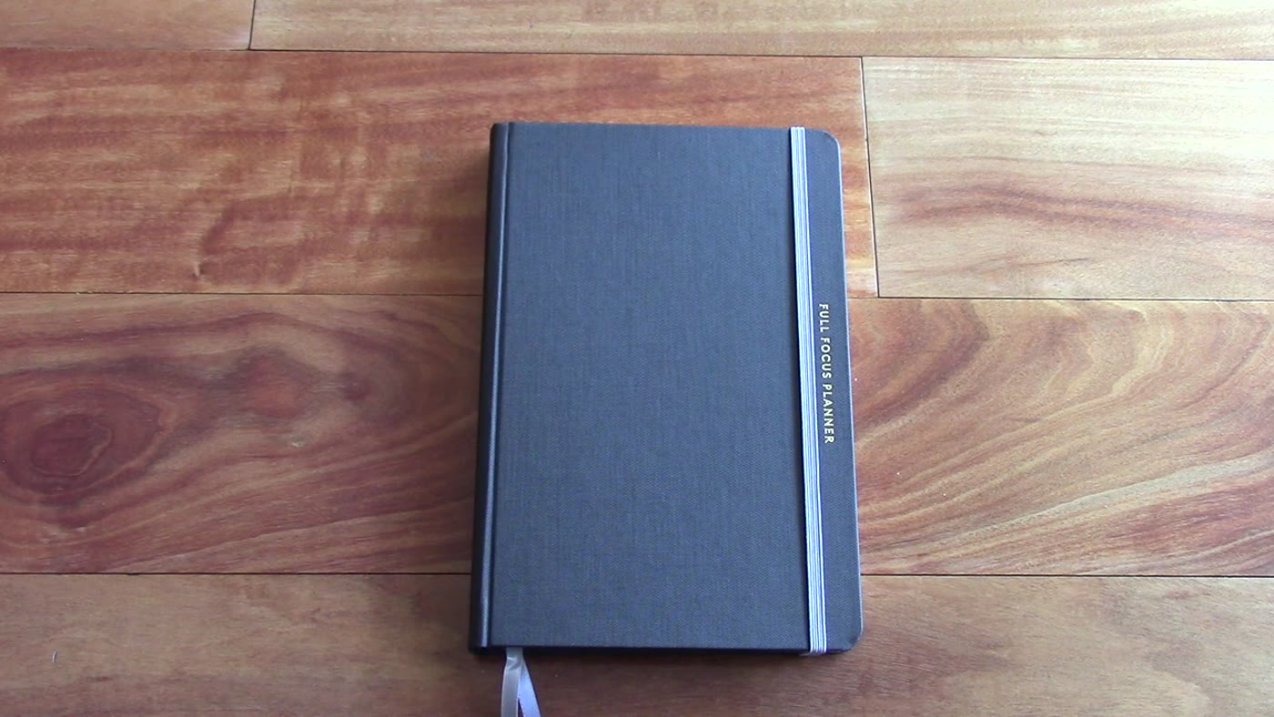 Full Focus Planner dark gray cover on desk