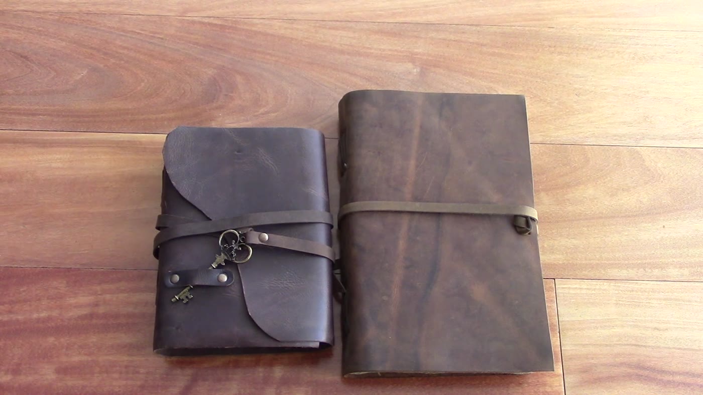 Two Nomad Crafts vintage leather journals side by side