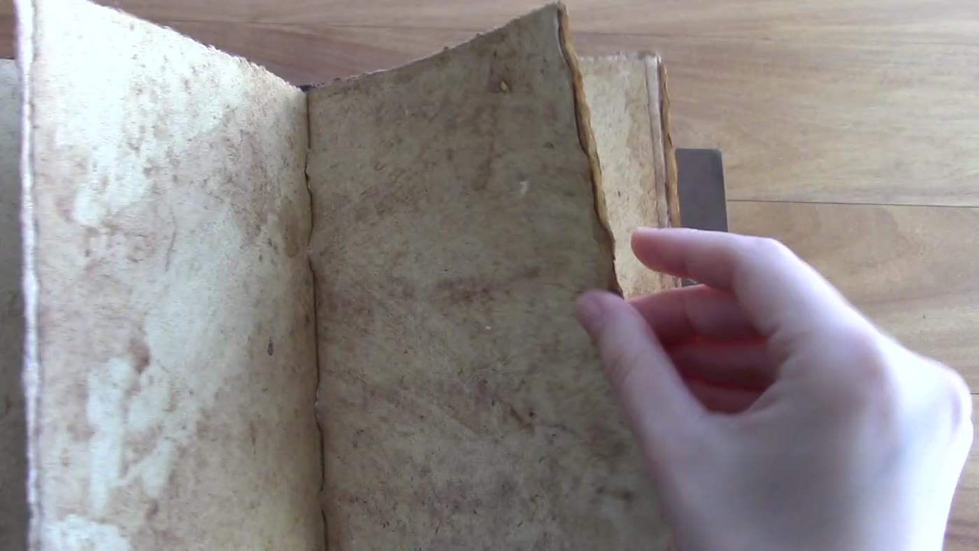 Aged cotton paper inside the Nomad Crafts journal