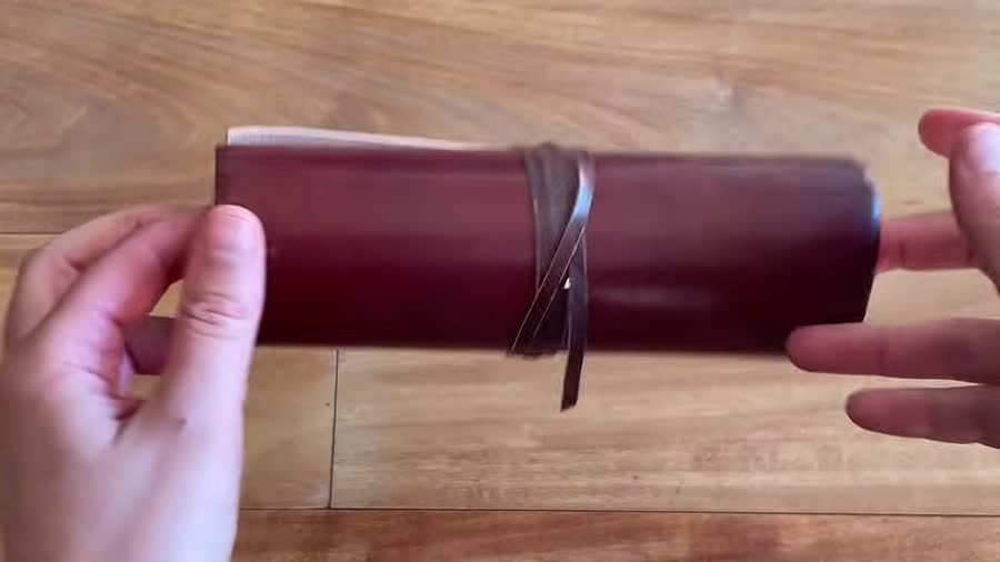 Roll Up Leather Journal Review 1 Roll-up leather journal closed with leather tie