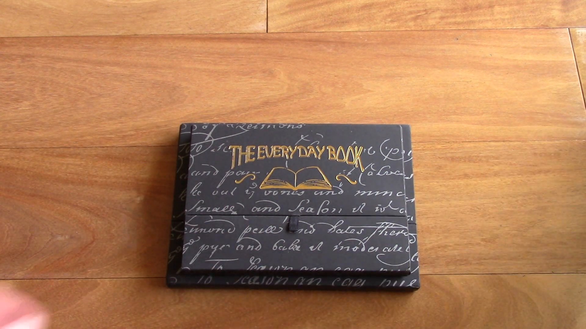 Galen Leather Everyday Book packaging box on a wooden desk