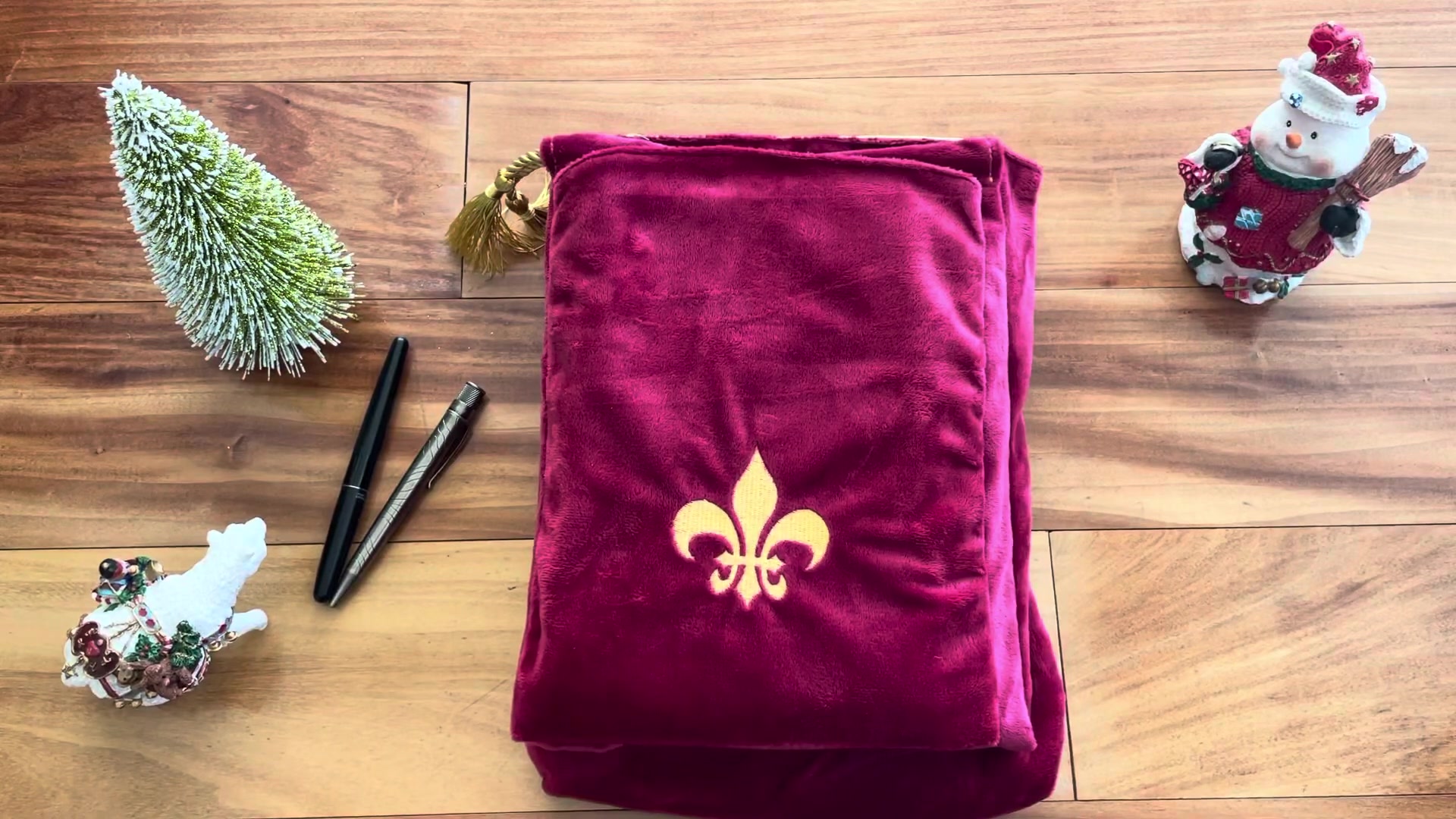 Holiday gift guide setup with journals on a table