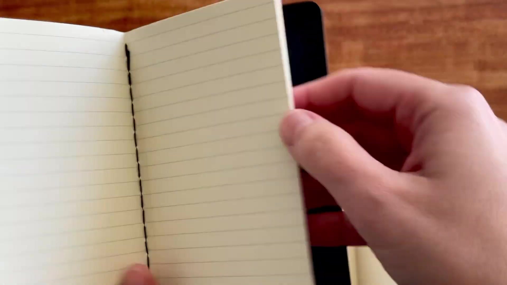 Moleskine vs Daler Rowney Pocket Notebook Comparison 5 Moleskine Cahier perforated pages and stitched binding close-up