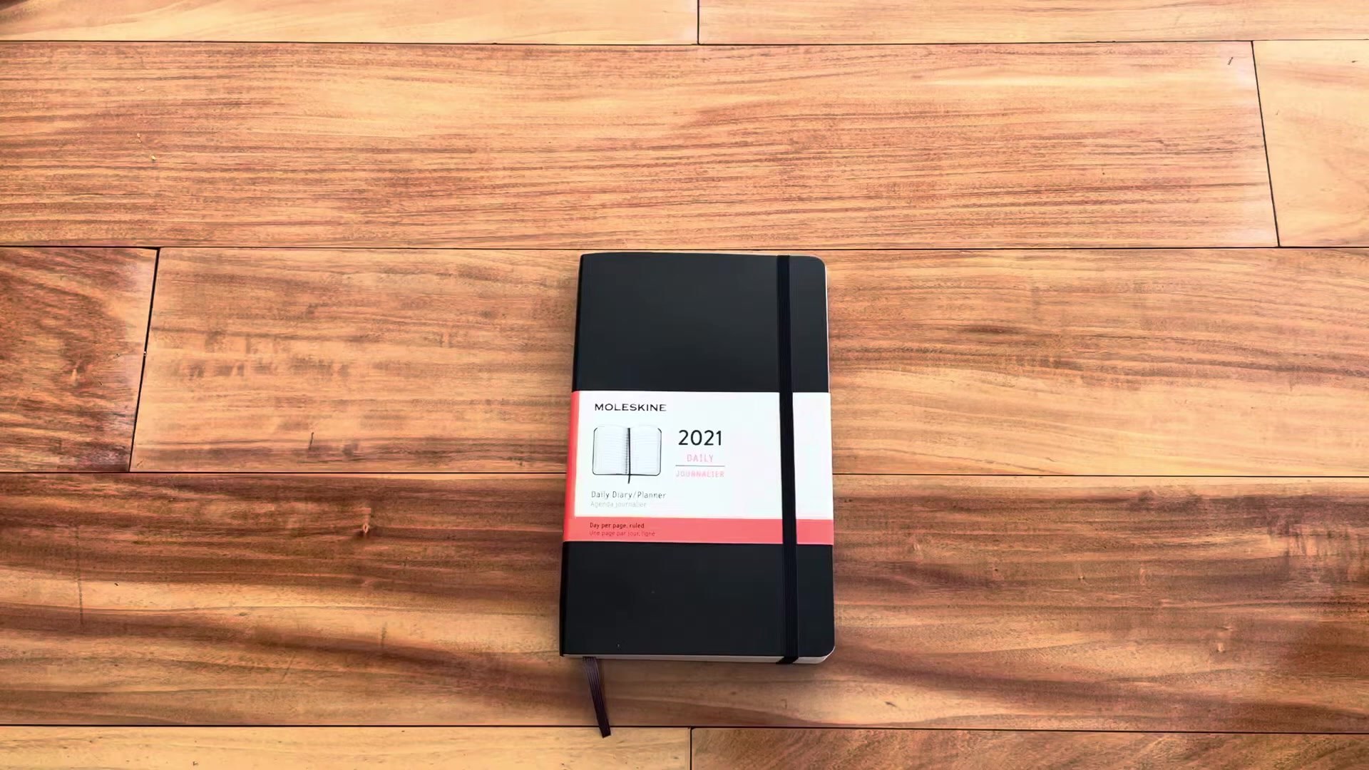 Moleskine Daily Planner Soft Cover Review 1 Moleskine Daily Planner soft cover shown closed on a desk