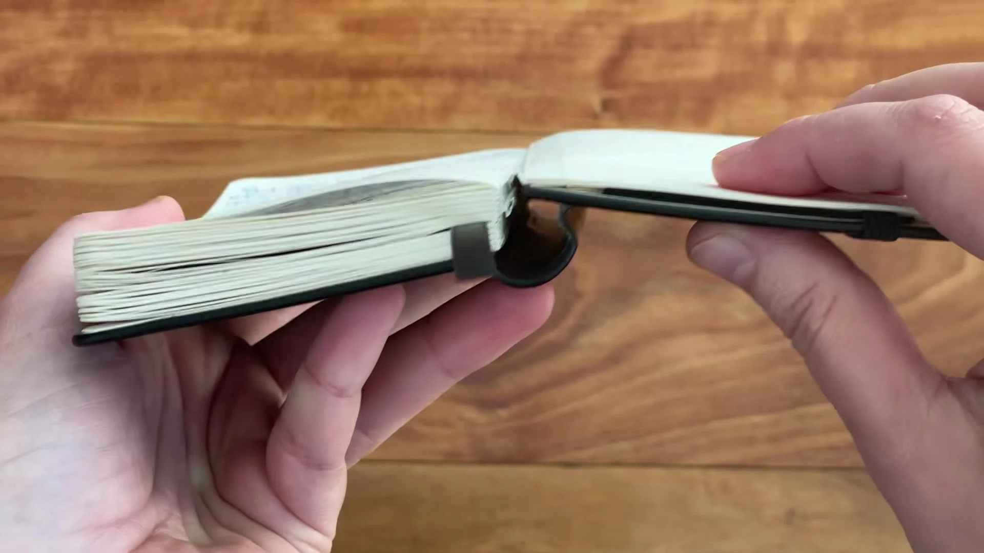 Close-up of a Writersblok notebook signature separating from the spine